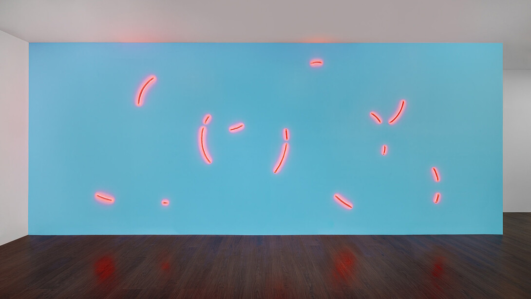 Stephen Antonakos, Ruby neon incomplete circles on a light blue wall, 1977. Courtesy of Bookstein Projects