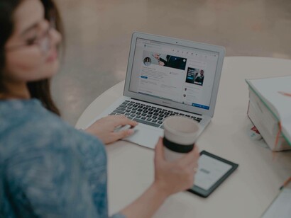 A woman conducting market research on social media platforms