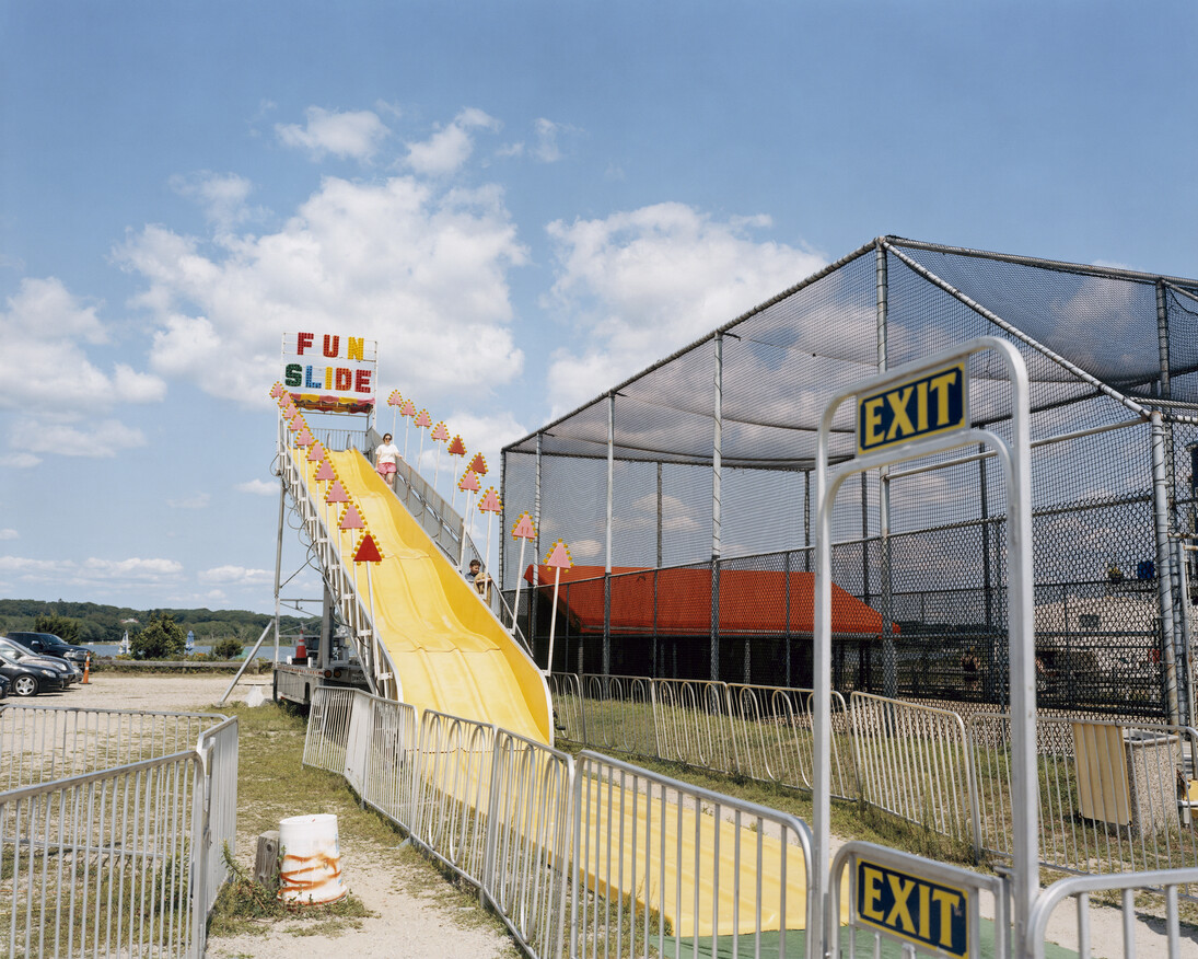 Tina Barney, Fun Slide, 2017, chromogenic color print, 48 x 60 inches, 121.9 x 152.4 cm, Edition of 5 (#1/5)© Tina Barney. Courtesy Paul Kasmin Gallery