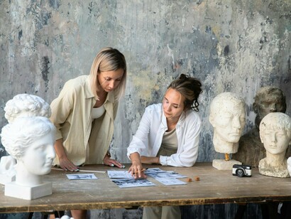 Two women working in an artistic environment, reflecting the future of careers driven by creativity and human insight