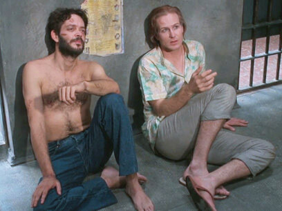 Fotograma de la adaptación cinematográfica de El beso de la mujer araña