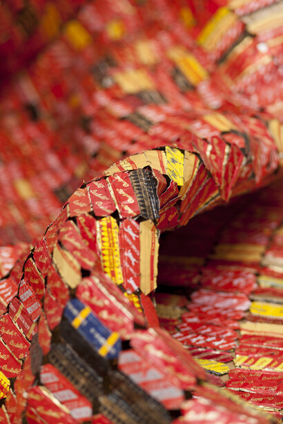 El Anatsui, AG + BA, detail, 2014 Installation, Aluminium and copper wire and nylon string, dimensions variable, Photo Jonathan Greet, Image courtesy October Gallery London