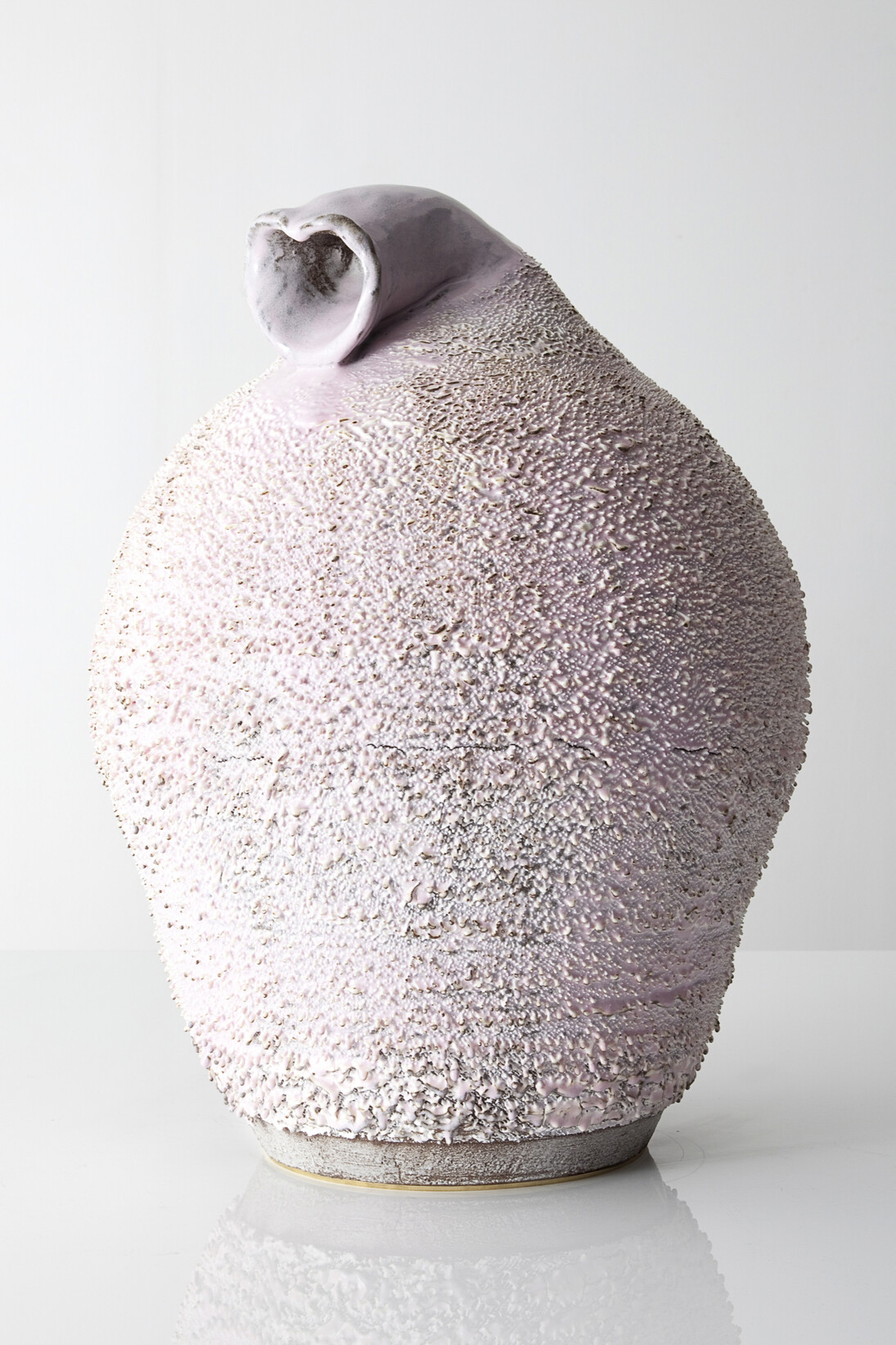 Unique, hand-thrown Large Marge Dong On Stomach Accretion vase with porcelain slip in Angelyne glaze. Designed and made by the Haas Brothers, Los Angeles, CA, 2013. 23" H x 19" D / 58.4cm H x 48.3cm D (SM4675).
Photograph by Joe Kramm/R & Company

