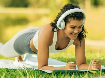 With every movement on the mat, she taps into the power of music to fuel her determination, embracing discomfort and pushing beyond her physical limits