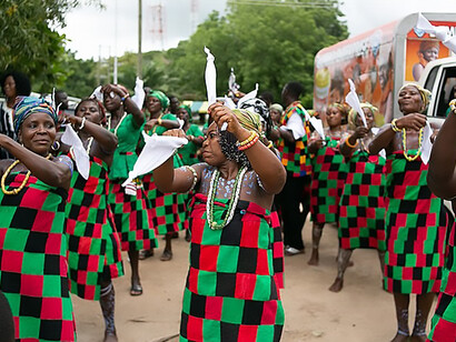 At the heart of the 2019 Kente Festival in Ghana, women donned in exquisite Kente cloth emanate a profound sense of cultural heritage
