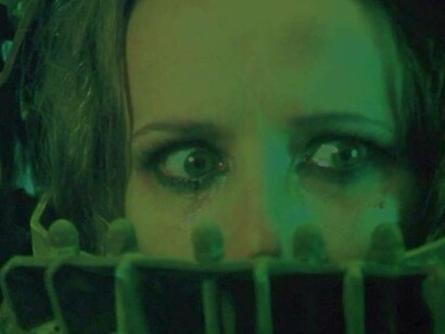 A woman trapped in one of the intricate death puzzles in the film Saw
