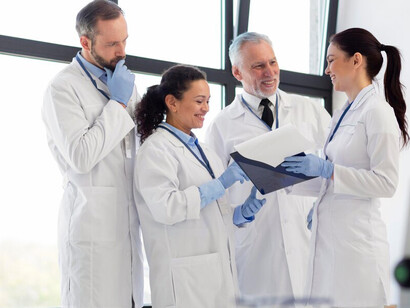 Scientists collaborating on chemical research demonstrate the importance of effective science communication and the role of scientific advisors in bridging research with societal impact