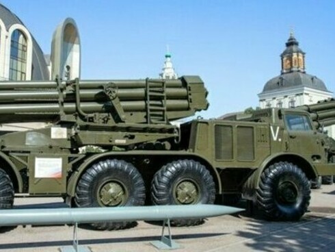 An outdoor exhibition of missile defense technology, reflecting the uneasy coexistence of security and fear