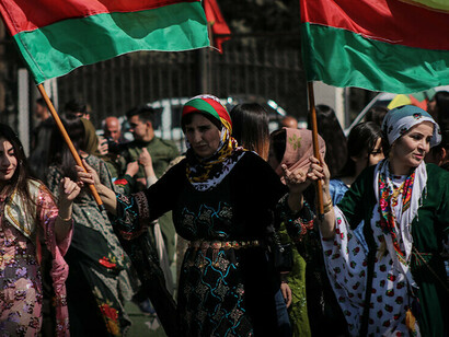 Kurdish women at a celebration of the anniversary of the revolution in Rojava @ Firat News Agency