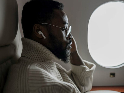 Passenger seated aboard an airplane