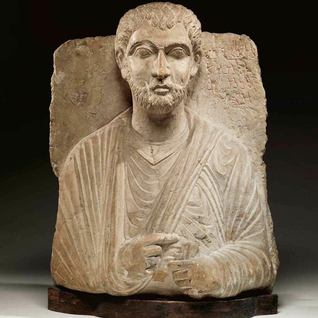 Anonymous (Palmyrene), Funerary Relief of Malkô from Palmyra, mid 3rd century, Palmyrene Empire, Limestone, 23 x 18 x 7 1/2 inches. Collection of Middlebury College Museum of Art. Purchase with funds provided by the Walter Cerf Art Fund, 2009.002