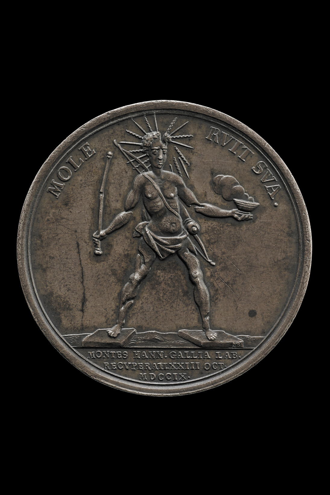 Colossus of Rhodes, 1709, Louis is shown as the Colossus of Rhodes crumbling under its own weight. The medal celebrates the capture of Hainault from the French in 1709 and is representative of the widespread feeling that Louis’ pre-eminence was coming to an end © The Trustees of the British Museum
