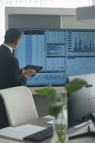 A crisis management leader monitors data to guide decision making in the sports industry 