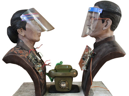 Heri Dono, Farewell Couple Called to Heaven, 2021, resin, electric device, telephone, concrete, dimensions variable
© Heri Dono, courtesy of the artist and Mizuma Gallery.