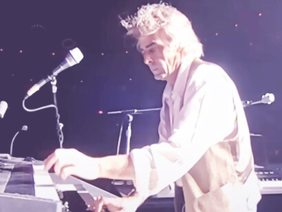 Relive the mesmerizing spectacle of Pink Floyd's Earls Court concert, held in London, England, on October 20, 1994, as the band captivated audiences with their iconic sound and visual extravaganza