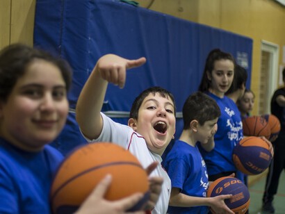 Kids from the team in the gymnasium