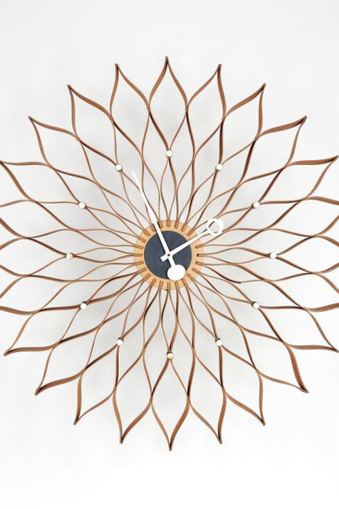 Irving Harper for George Nelson Associates, Sunflower clock, 1958. Lacquered wood, enameled aluminum, and enameled brass. Manufactured by Howard Miller Clock Company. Collection of William and Annette Dorsey. Photograph by John R. Glembin.

