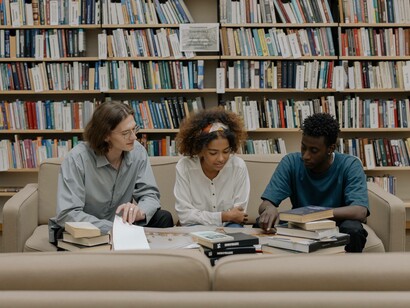 A group of students from economics class studying together