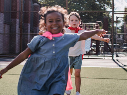 Laughter fills the air as these children discover the joy of play, reminding us that friendships are built on shared moments of happiness