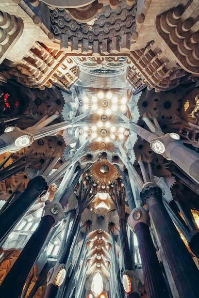 The intricately ornamented interior of La Sagrada Família in Barcelona, Spain, showcases a breathtaking blend of artistic design and architectural innovation