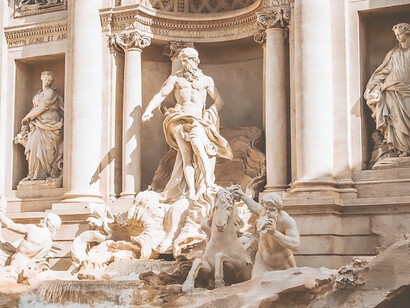 Tossing a coin into the Trevi Fountain for good luck – a timeless tradition in the heart of Rome, Italy
