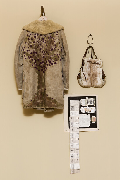 f.marquespenteado, Enraizar Jonas, 2011/2014, canvas coat with wool lining, leather shoes aniline, wood hanger, backpack, and collage on cork and felt, found objects stitched by hand, Edition: N/A, 193 x 105 x 30 cm. Courtesy of Mendes Wood DM, São Paulo