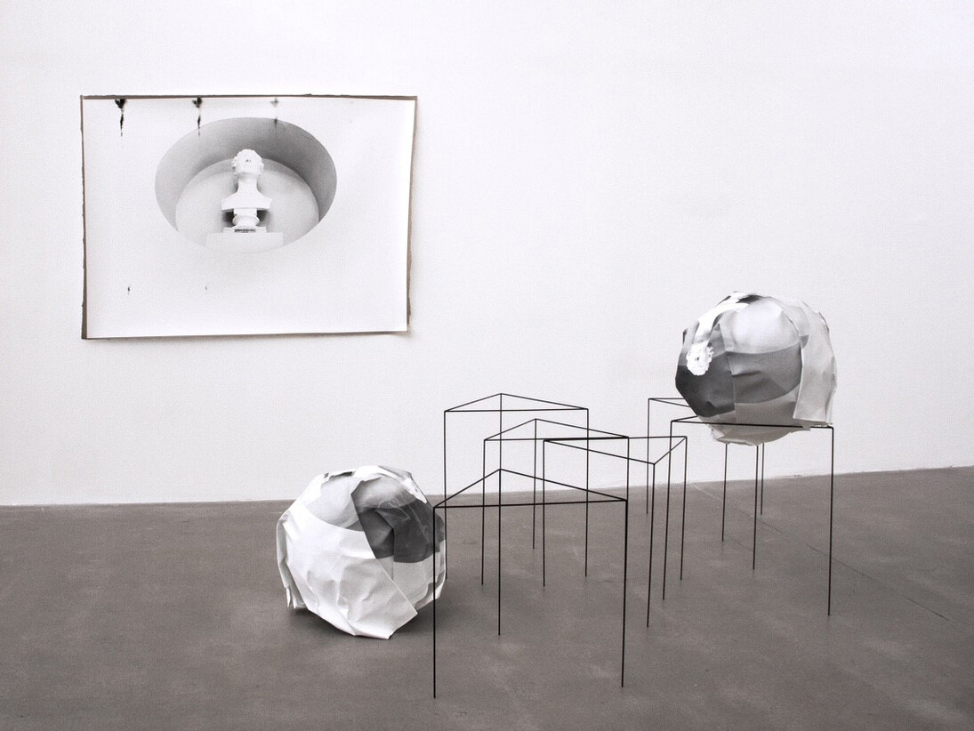 Andrea Jespersen, ‘we draw some arbitrary line and rule out whole areas of investigation (part two)’, hand-printed analogue gelatin silver prints, gummed tape, powder-coated steel, variable size, shown installation 350 cm x 350 cm x 250 cm 
2013
