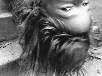 Upside-Down Girl. 1974, 16 x 20 inch gelatin silver print