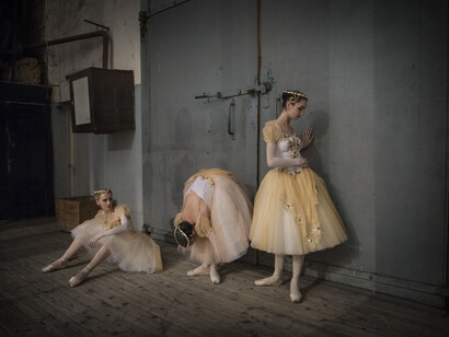 Giorgio Bianchi, Donbass stories - Spartaco and Liza: Ballerinas of the Donbass Opera Theatre warm up before the exhibition.
Every stage costume pass through Liza hands to be refined.