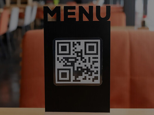 A café featuring a QR code menu for a contactless dining experience