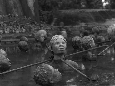 Bodies submerged and bound, reflecting the violence, death, and dehumanization that defined enslavement and its lasting trauma