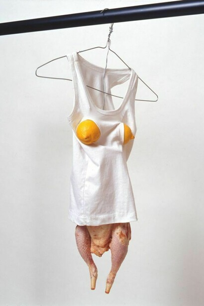 Happy Families (detail), 1999, Garment rail, three hangers, wire, pipe cleaners, two fried eggs, vac-packed fish, nylon raincoat, sausage, two baps, child's vest, two melons, chicken, 159.5 x 183 x 56 cm, Copyright the artist, courtesy Sadie Coles HQ, London