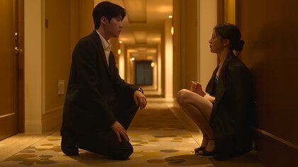 Ho-jin kneeling beside Mu-hee during one of her lowest moments, representing the true meaning of showing up when love is tested