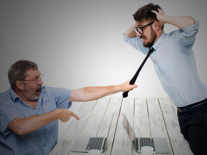 In a depiction of business conflict, two men are shown expressing negativity, with one man visibly grabbing the necktie of his opponent, illustrating a tense and confrontational situation within the workplace