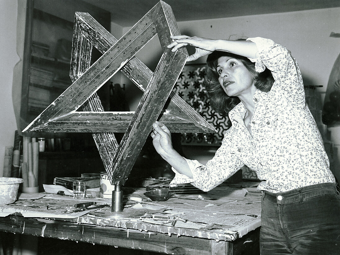 Monir Shahroudy Farmanfarmaian in her studio working on Heptagon Star, Tehran, 1975. Photo: Courtesy of the artist and The Third Line, Dubai