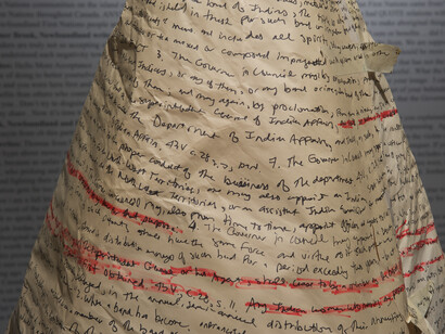 Hallway (9): Jordan Bennett, Sovereignty Performance | Cérémonie de la souveraineté (2009), recycled paper, burnt trees, regalia | papier recyclé, arbres brulés, costume traditionnel, courtesy of the artist | avec la permission de l’artiste