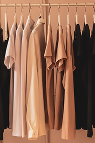 A capsule wardrobe is characterized by a deliberate and thoughtful approach to clothing, emphasizing a pared-down selection of versatile, high-quality pieces
