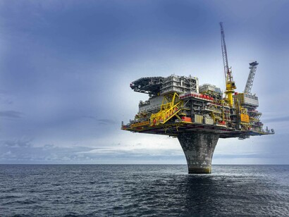 An offshore oil rig collecting a valuable resource in the Atlantic Ocean