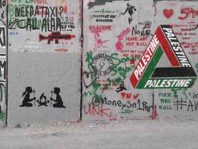 En sus esténciles, Cake $ pone a la infancia en el foco del conflicto palestino israelí