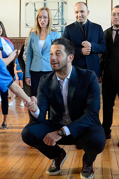 Greeting kids from a youth academy