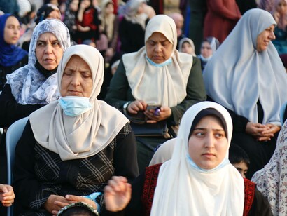 Women in Gaza collect together