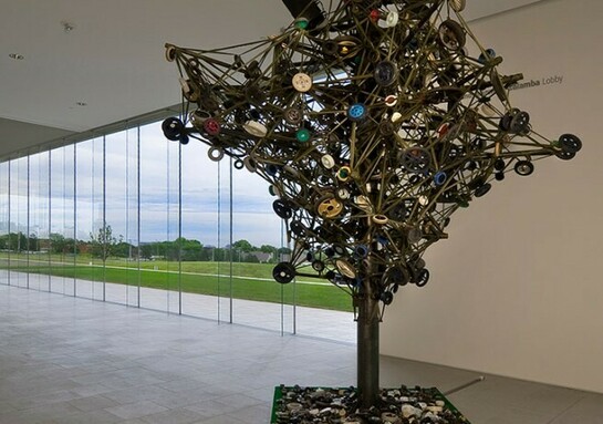 Nari Ward, Land, 2002-present, Metal, wood, parachute materials, barrier cloth, used wheels, and audio elements, 197 x 39-3/8 x 157-1/2 inches, Installation view: Nerman Museum of Contemporary Art, Overland Park, Kansas, Image courtesy the artist and Lehmann Maupin, New York, and Hong Kong