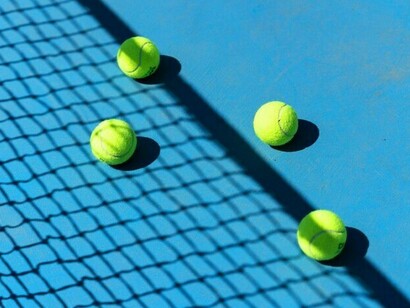 Les balles qui traînent indiquent la fin du match, il reste encore à déterminer le vainqueur