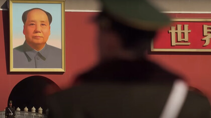Soldier in front of Mao Zedong's picture, Tiananmen Square, China