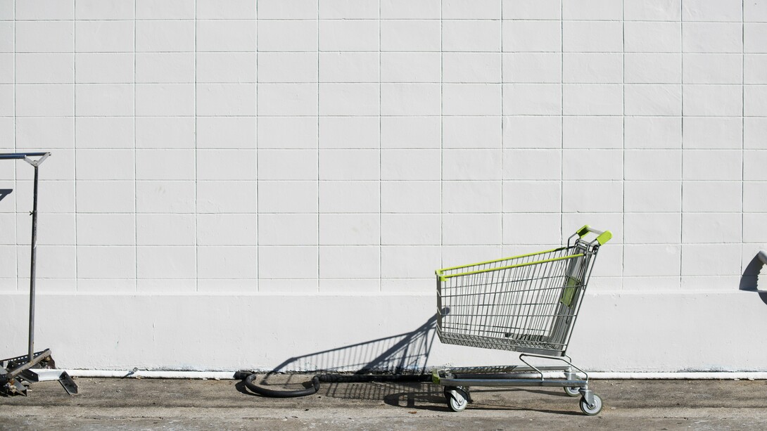 An abandoned shopping cart as a symbol for lost customers, reflecting the impact of neglecting consumer needs and expectations