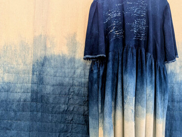 Caroline Mayers, 5am Thoughts on a long marriage. Linen quilt, dress, and cotton thread, all dyed with indigo. Brass hoop, 2025