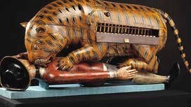 'Tipu's Tiger', a carved and lacquered wooden semi-automaton, Mysore, India, about 1793. Museum no 2545 (IS). © Victoria and Albert Museum, London