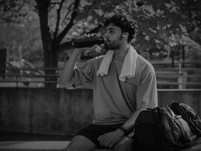 Make losing weight an intention, a top priority with attainable, measurable goals. A man drinking water after exercising