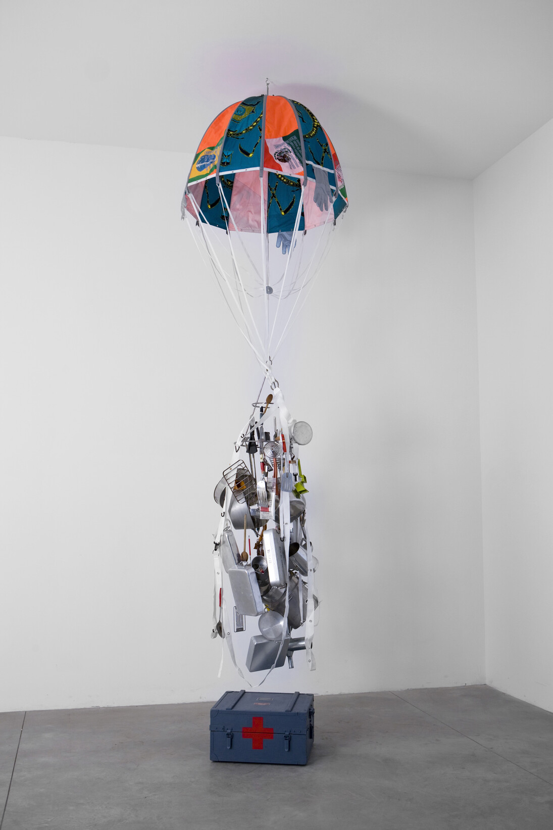Antarctic Village - No Borders, Drop Parachute, 2007-2008
Coated polyamide, fibre glass rods, various textiles, nation flags, kitchen utensils, objects, silkscreen print, webbing, red cross crate
120 cm diameter, approx. 3 m from ground variable
Courtesy of the artists. Photo: Ela Bialkowska
