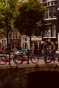Amsterdam's bike-friendly ethos shines through its picturesque canals and bustling streets